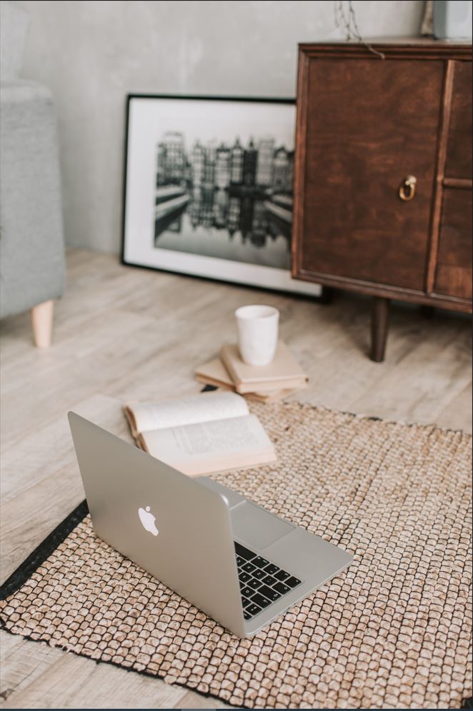 Computer on the floor.