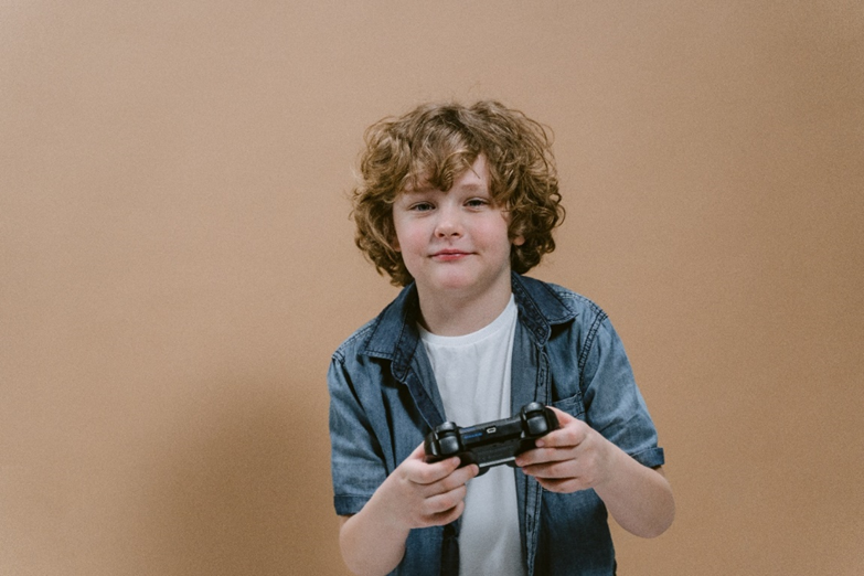 Boy holding a controller