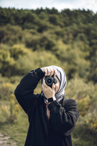 picture of a young woman taking a picture 