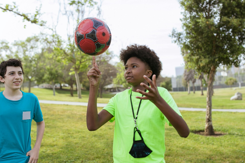 Kids playing with a football