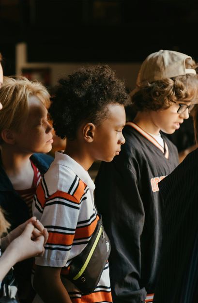 Boys looking at something 