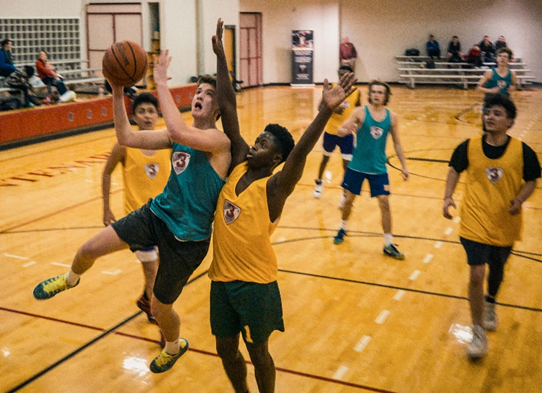 Picture of teenage boys playing basketball