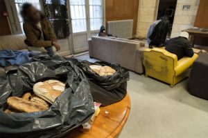 Bags with bread in the common room.
