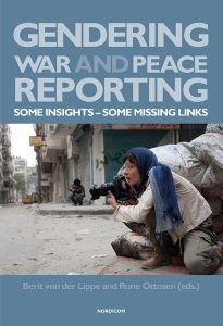 a picture of a female war photographer
crouching in a street.